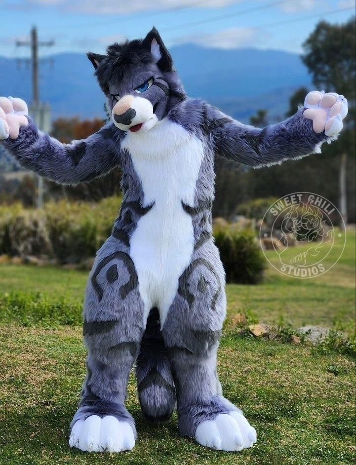 Thunder the snow leopard fursuit photo 3