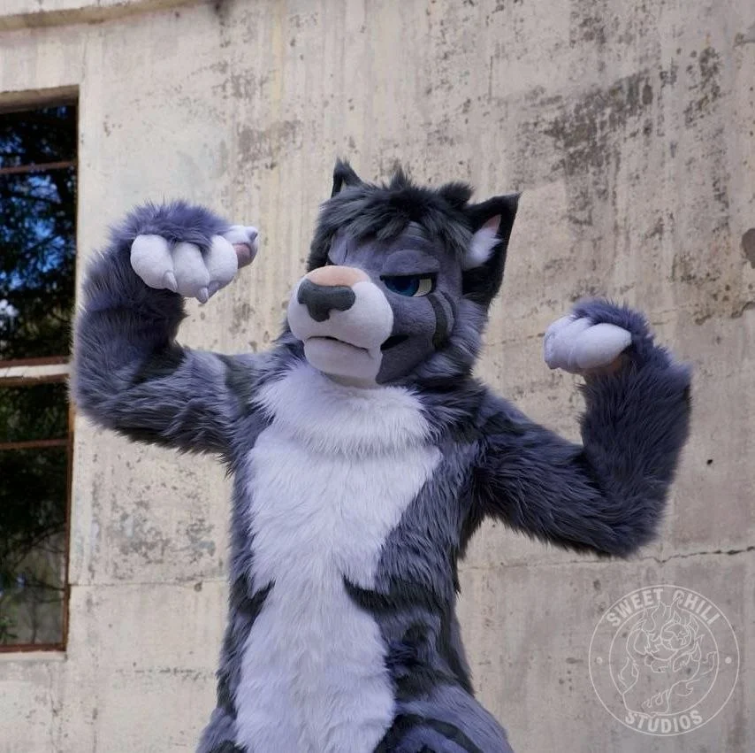Thunder the snow leopard fursuit photo 4